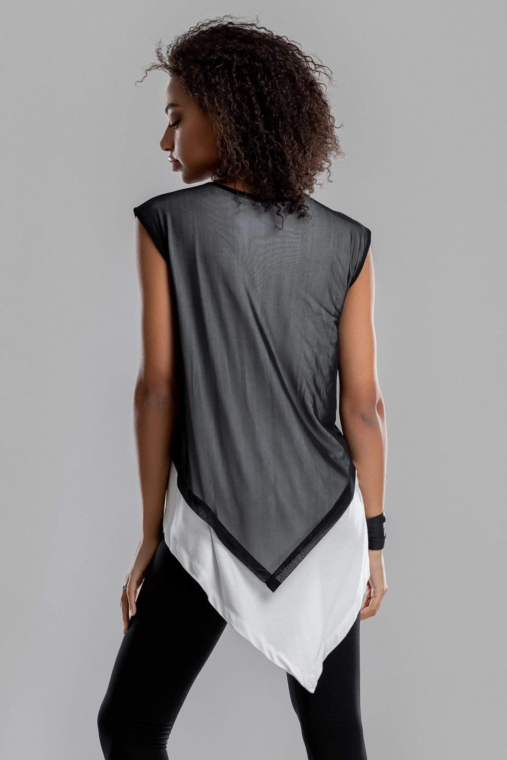 Asymmetrical white shirt with black mesh top